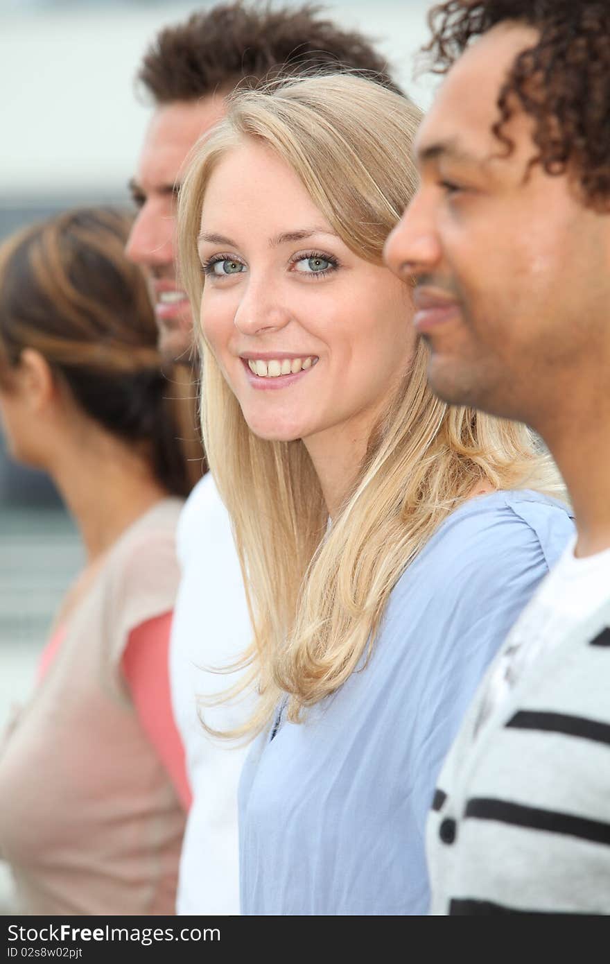 Closeup of happy student standing outside. Closeup of happy student standing outside