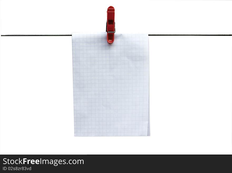 Isolated paper with clothes-peg on the wire on a white backround