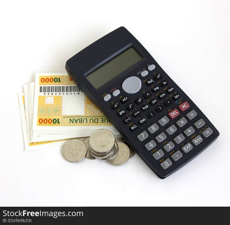 Calculator and money isolated on a white backgorund