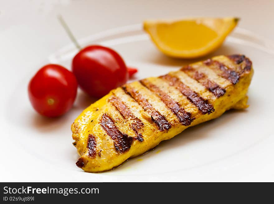 Roasted cutlet with tomato and chili,salad