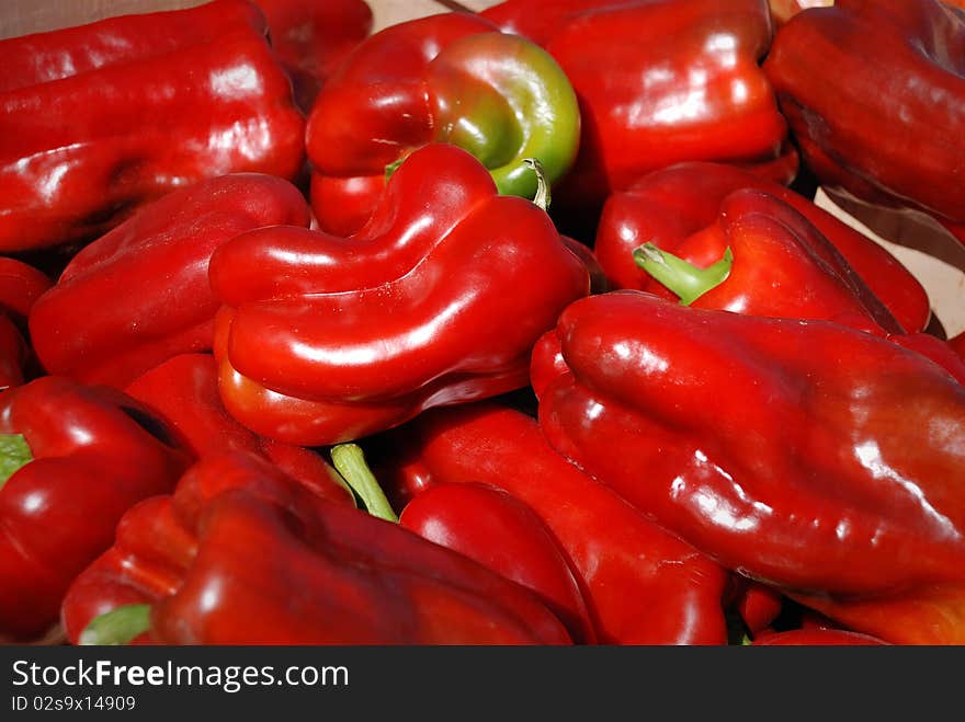 Group of colorful red peppers background