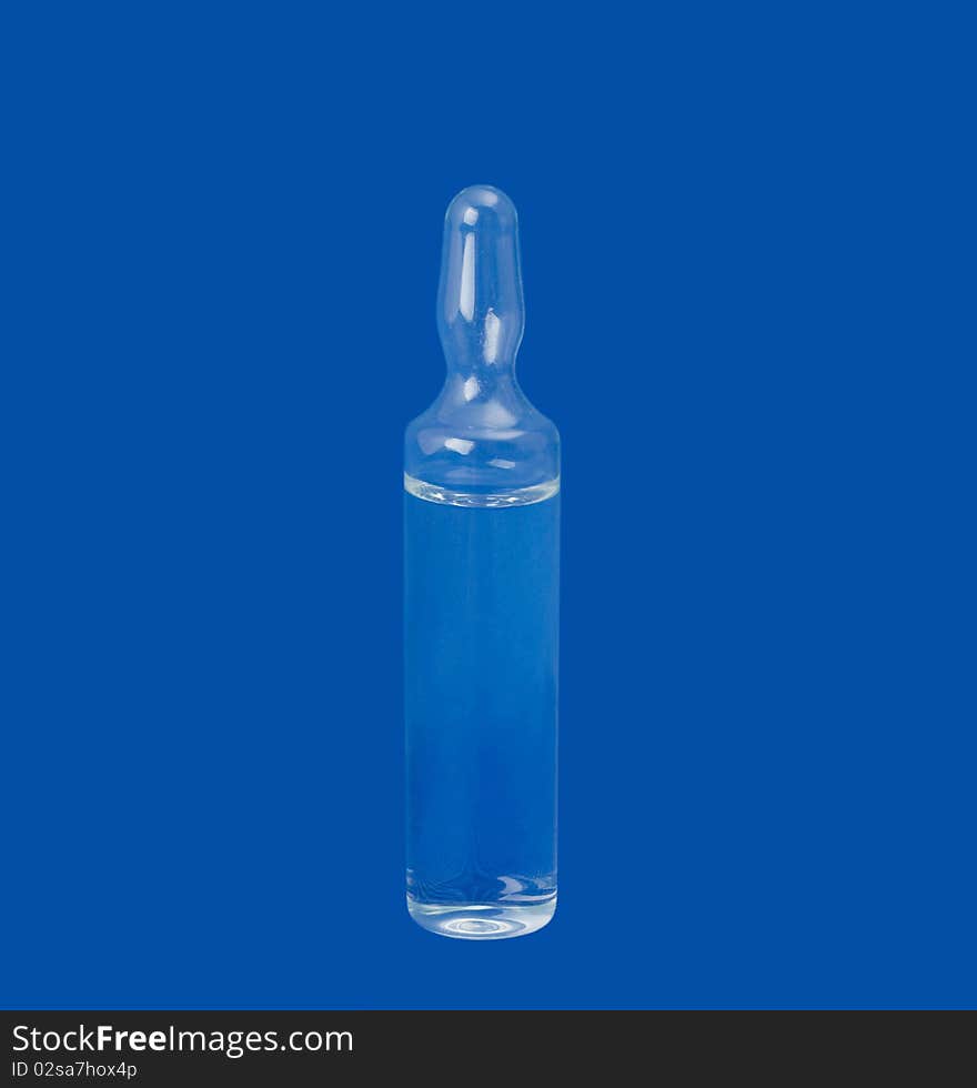 Ampoule on a blue background