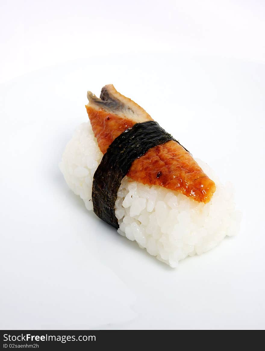 Unagi sushi of eel with ginger, seaweed and sesame. Unagi sushi of eel with ginger, seaweed and sesame