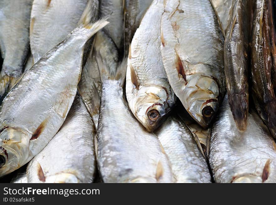 White fish drying as background