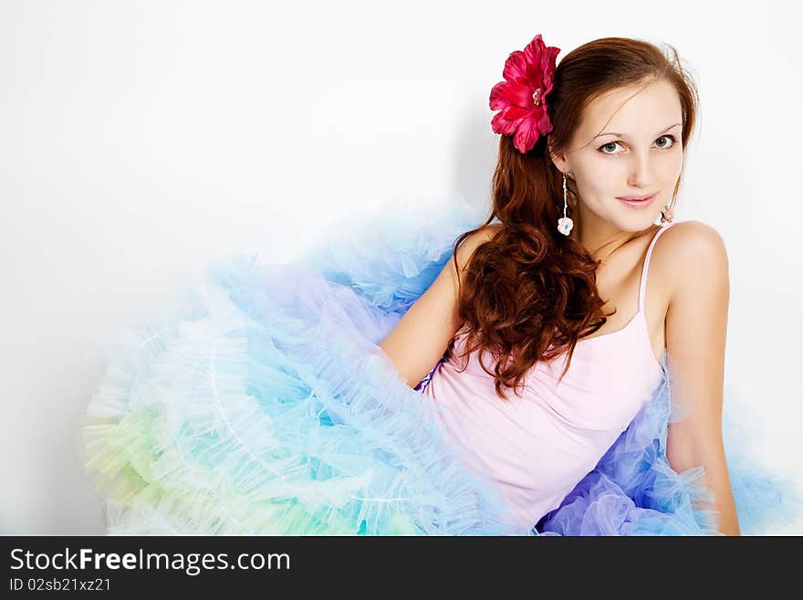 Beautiful young  woman in white background.