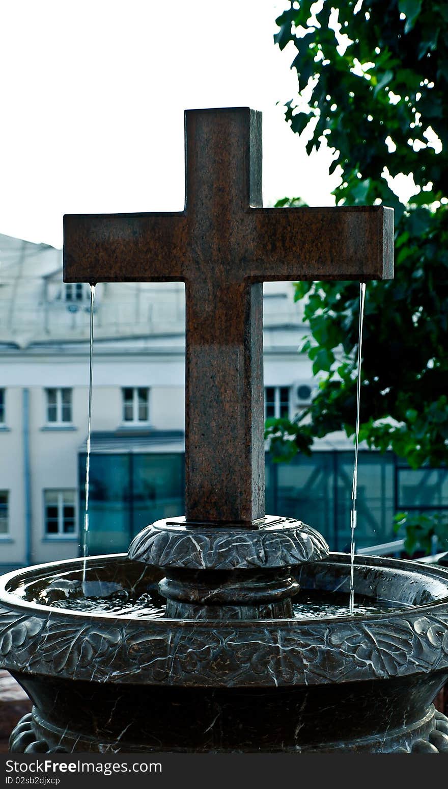 Religious chrisscross like a fountain in church yard