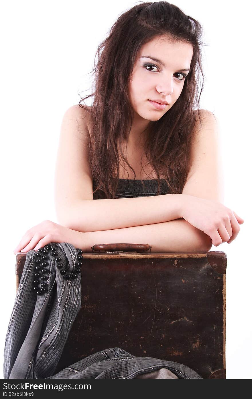 Girl Leaning On Old Suitcase