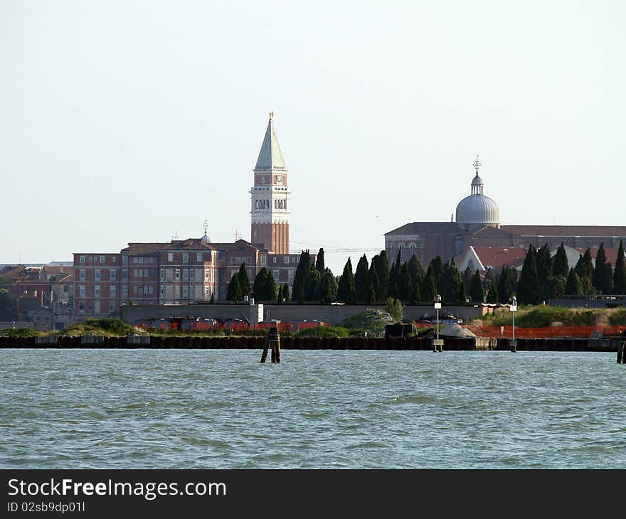 Towers and canal in Venice, Italy