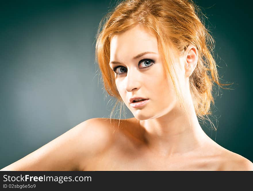 Portrait of a young red-haired woman. Portrait of a young red-haired woman