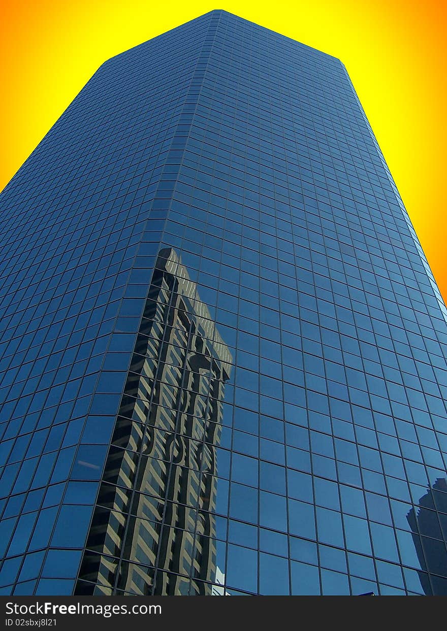 Glass face building in Toronto acts like a mirror. Glass face building in Toronto acts like a mirror.