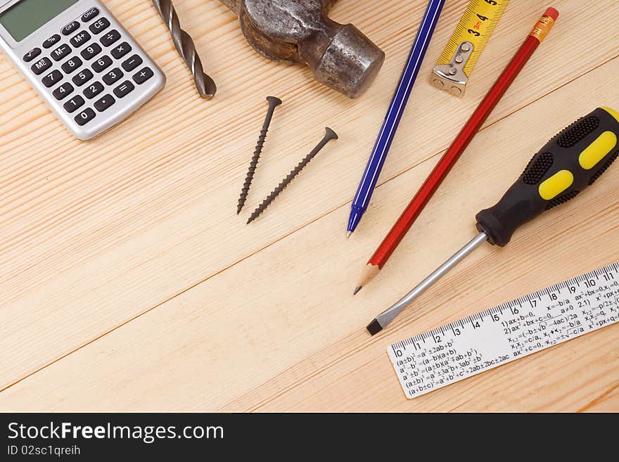 Set of tools on wood  background