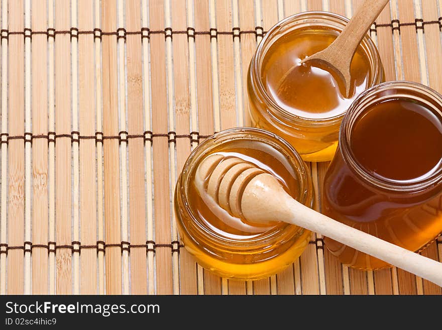 Three glass pot with honey