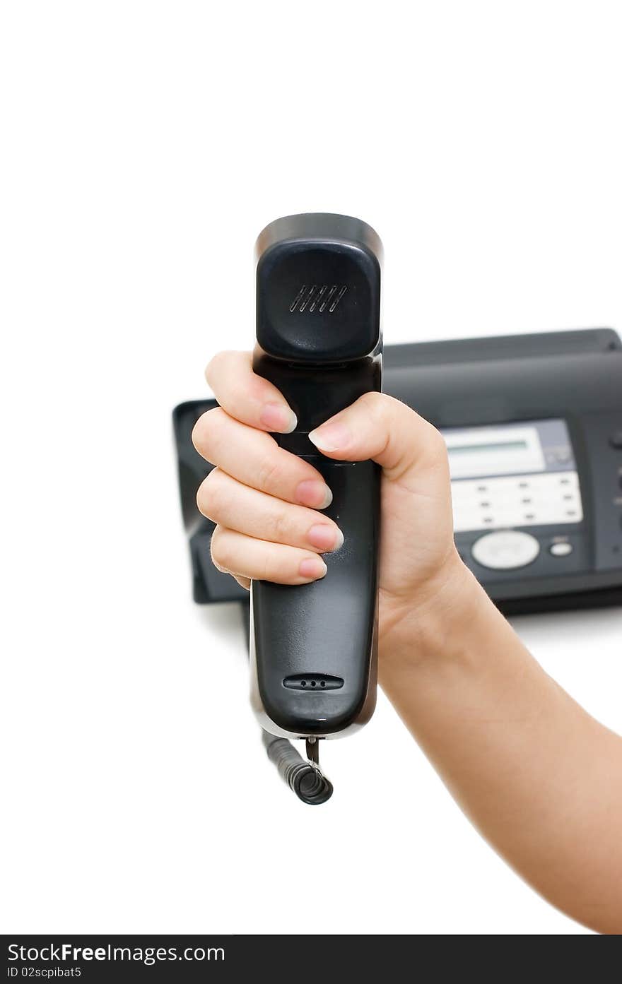 Telephone receiver in hand isolated on white background