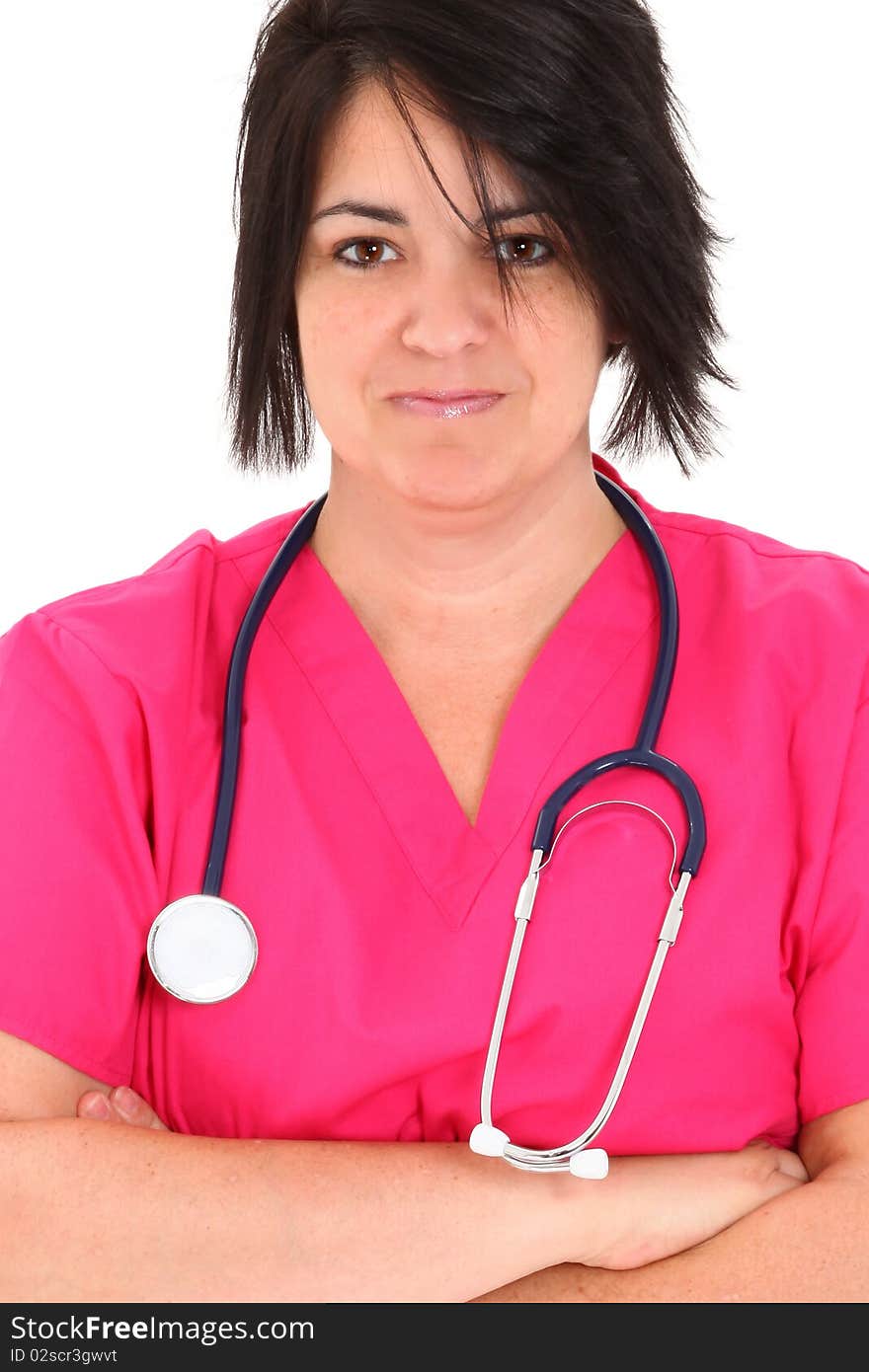 Attractive forty year old over weight nurse in pink scrubs with Stethoscope over white background. Attractive forty year old over weight nurse in pink scrubs with Stethoscope over white background.