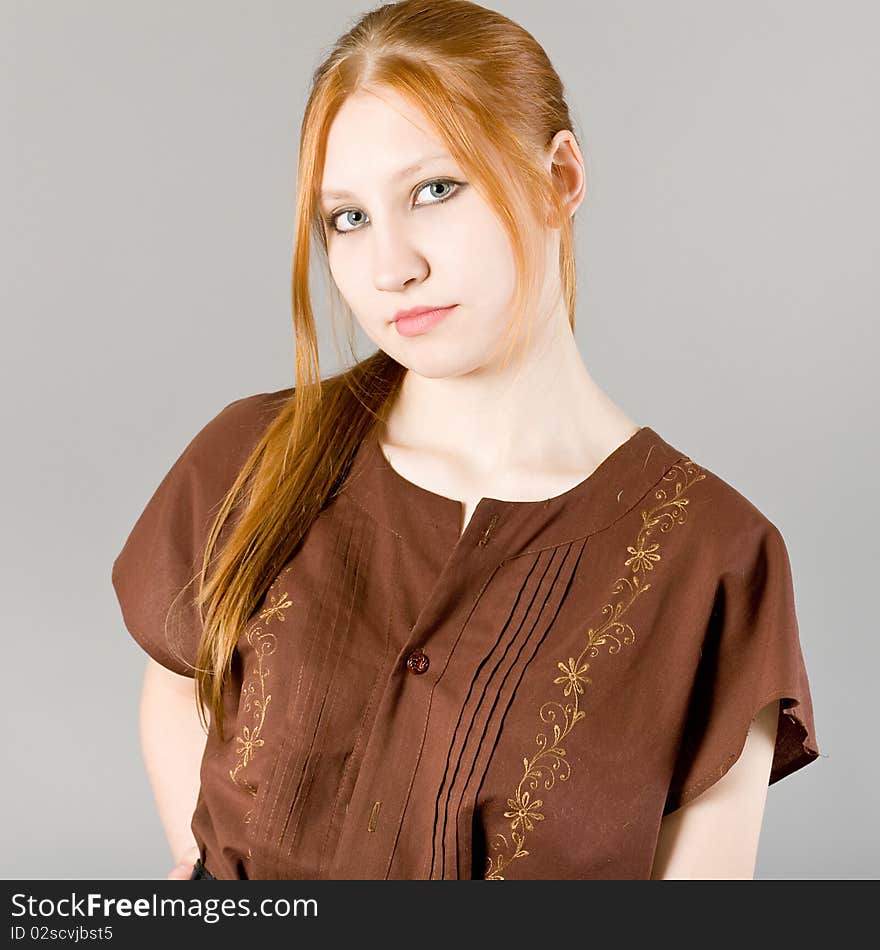 Young attractive girl in shorts and a blouse. Young attractive girl in shorts and a blouse