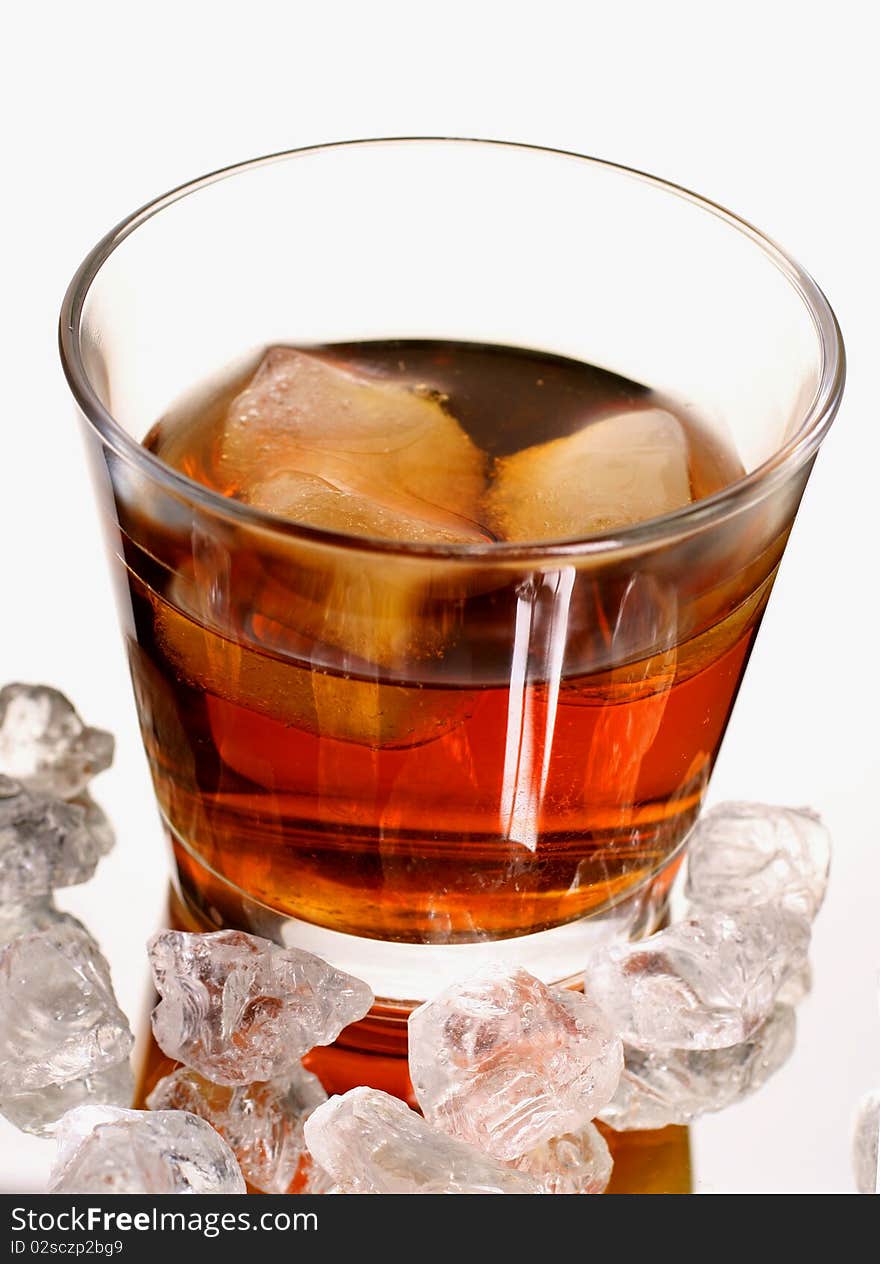 Cold whisky with ice cubes