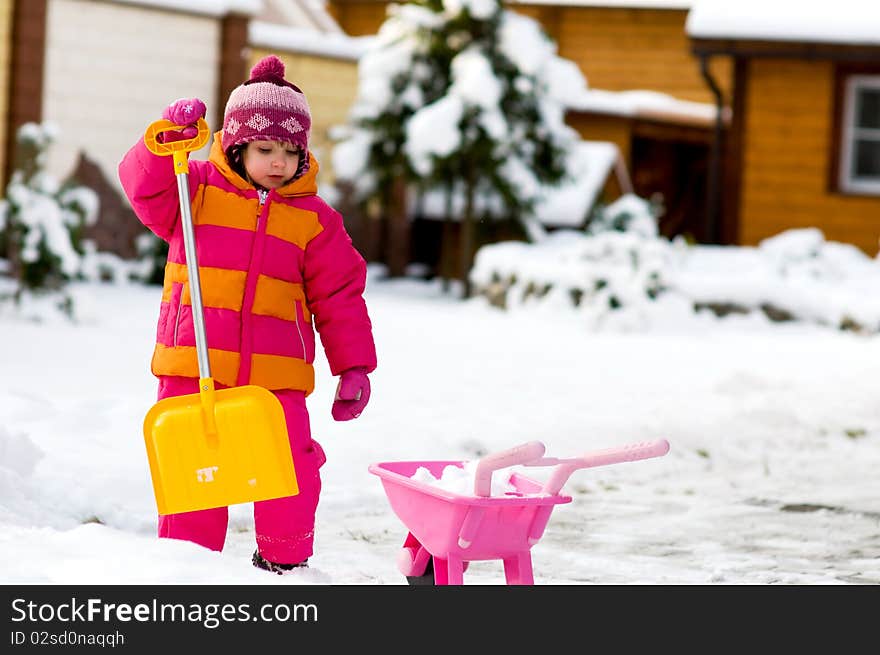 Nice Little Girl Playing With Snow