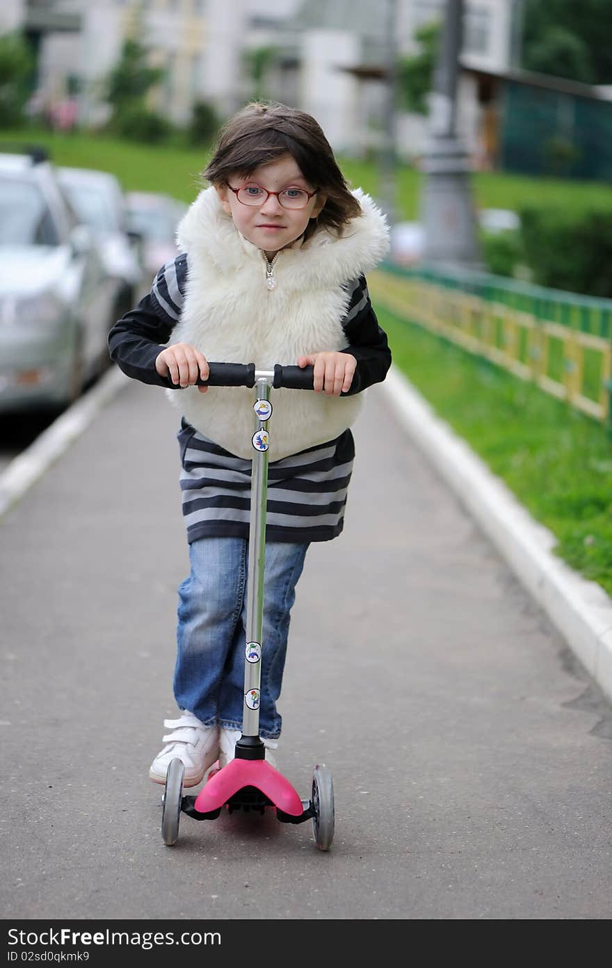 Nice Litlle Girl With Pink Scooter