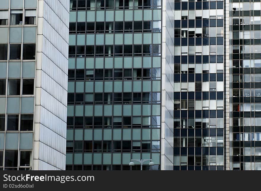 Windows of several office buildings in a row