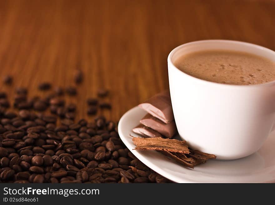 Cup pf coffee on wood background