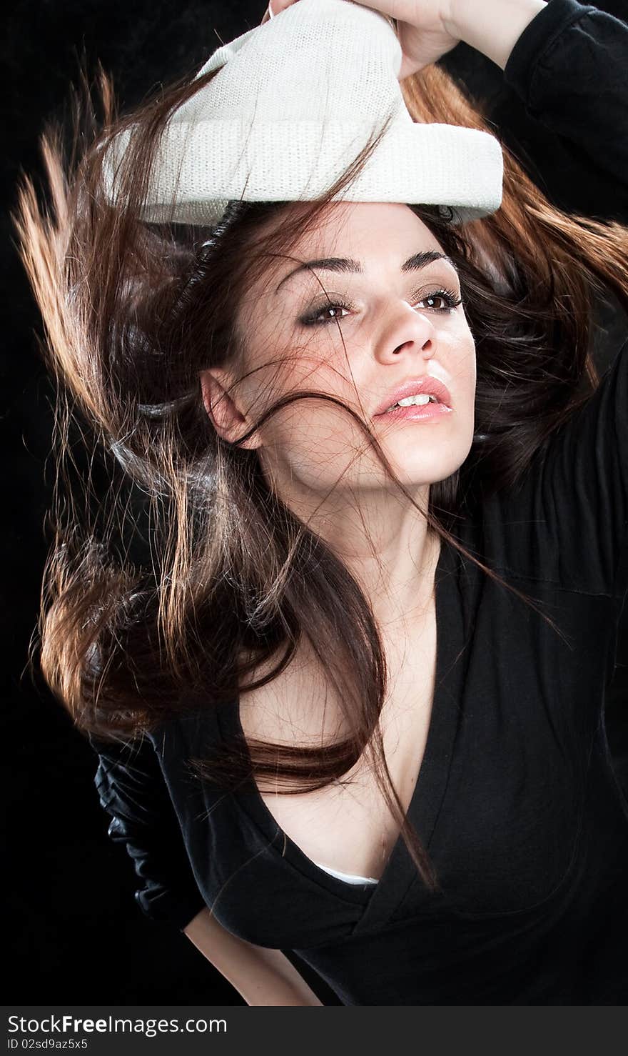 Beautiful fashion woman portrait with white hat, studio shot