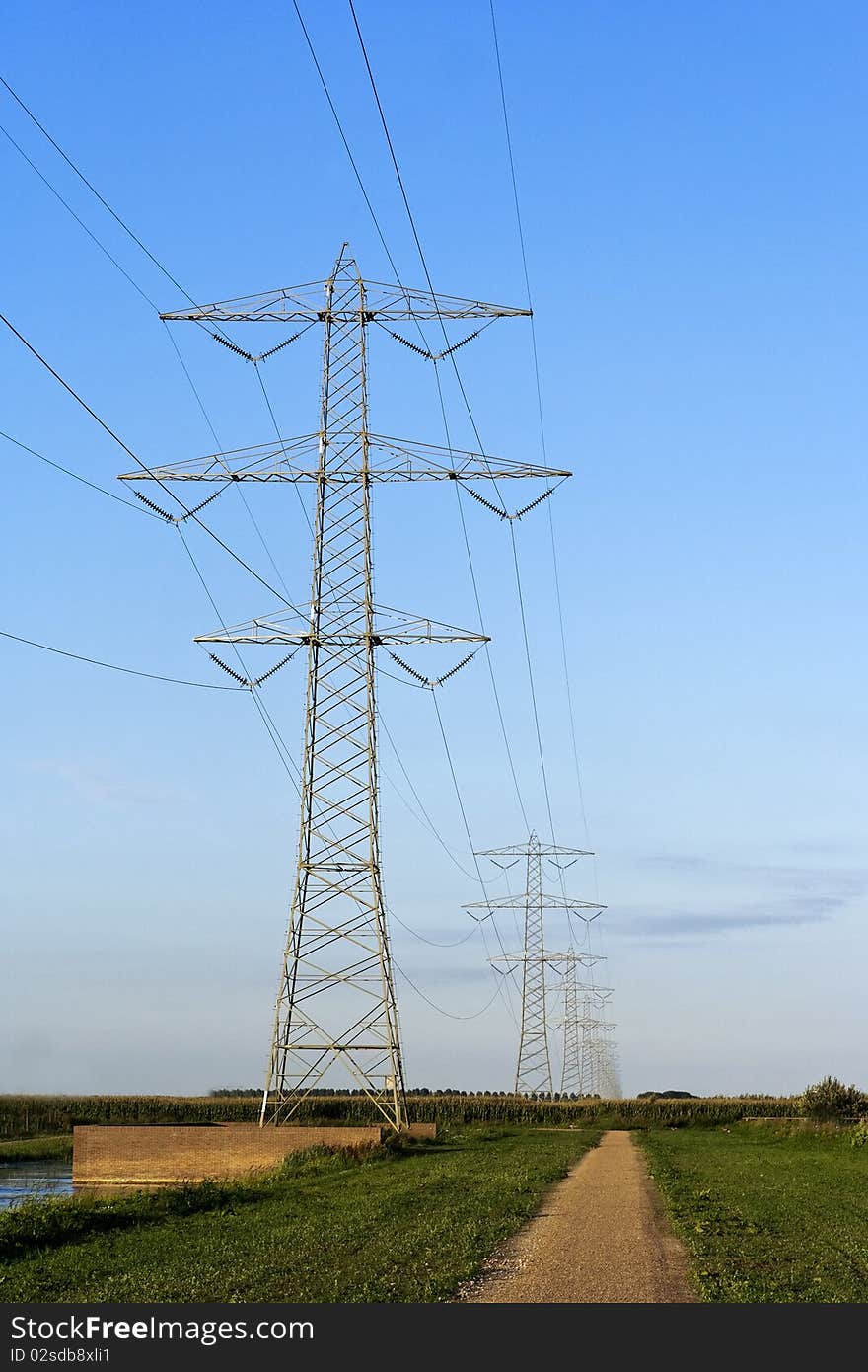 Endless power lines over Dutch landscape