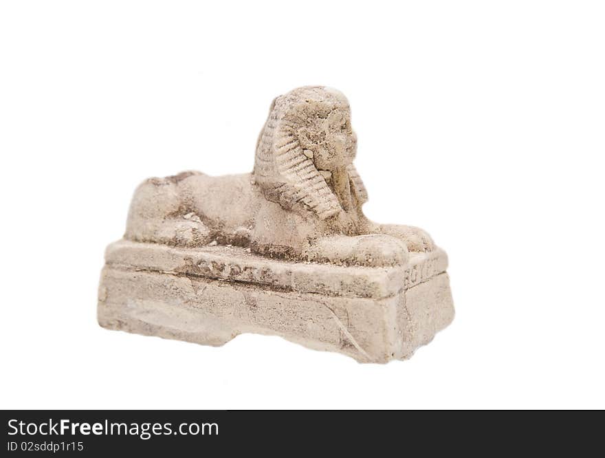 Gypsum statue of a sphinx on a white background