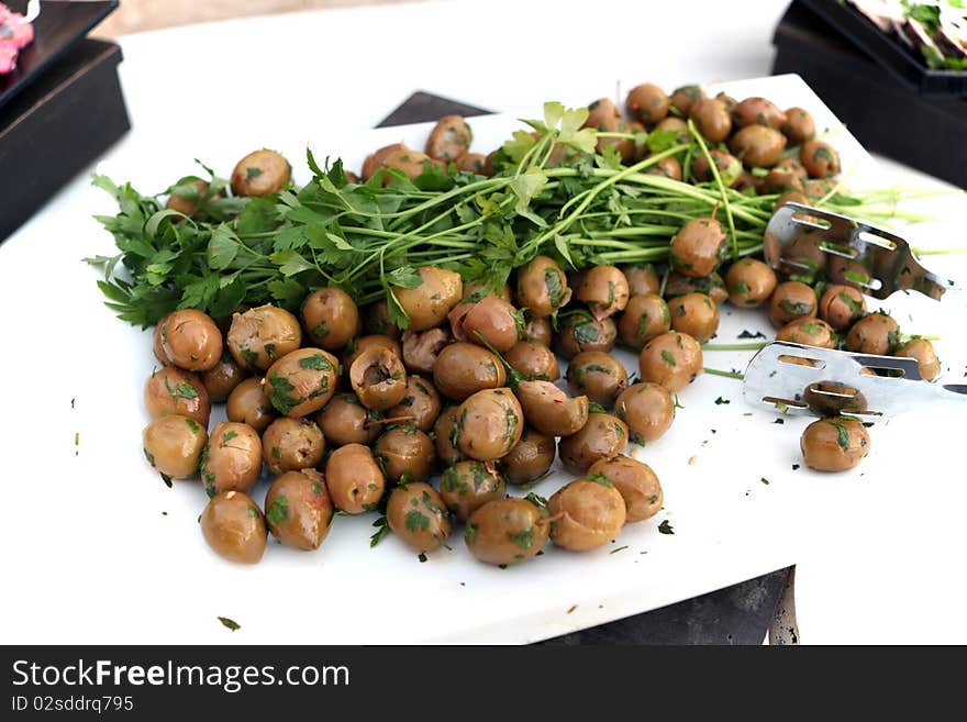 Served green olives in a restaurant