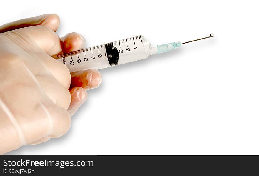 Gloved Hands With Syringe