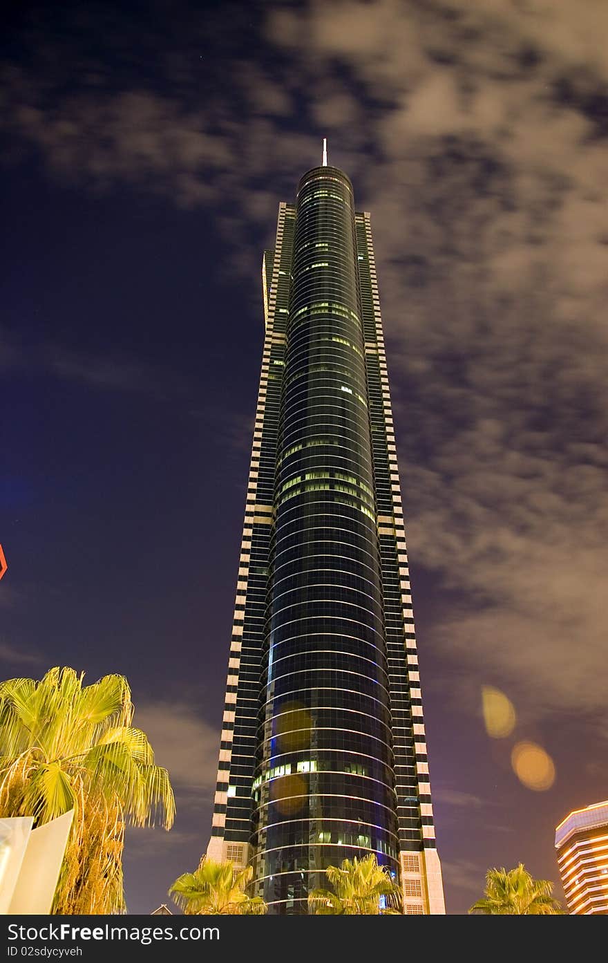 Night photo of highest skyscraper by night, modern business city Shenzhen in China.