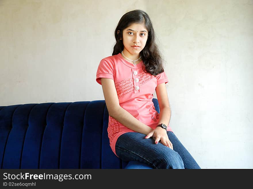 A portrait of a young Indian woman