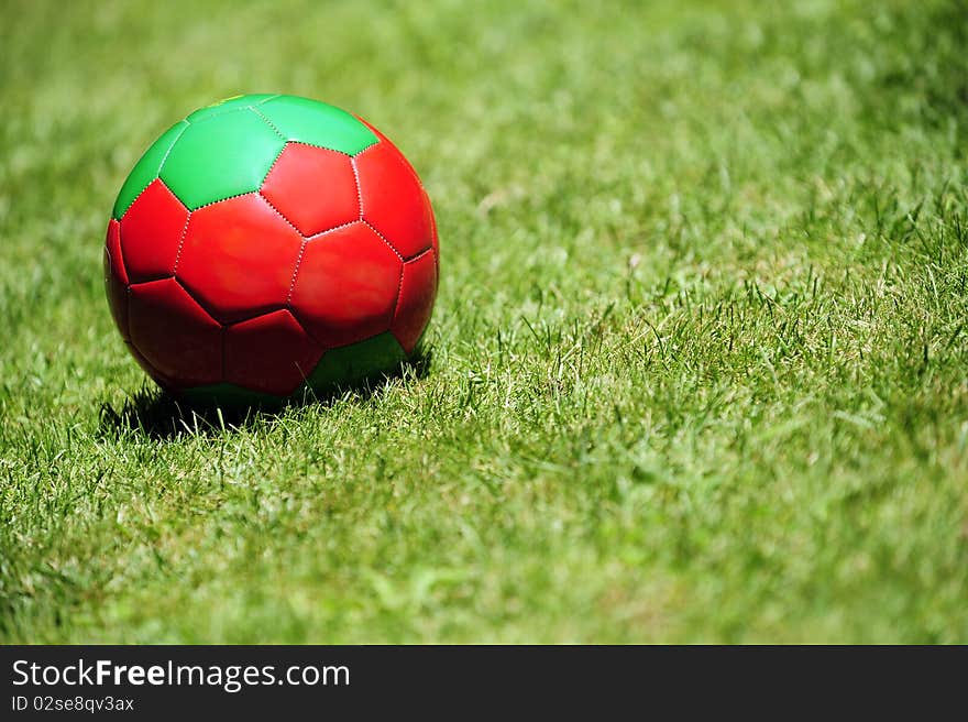 A soccer ball on a football pitch