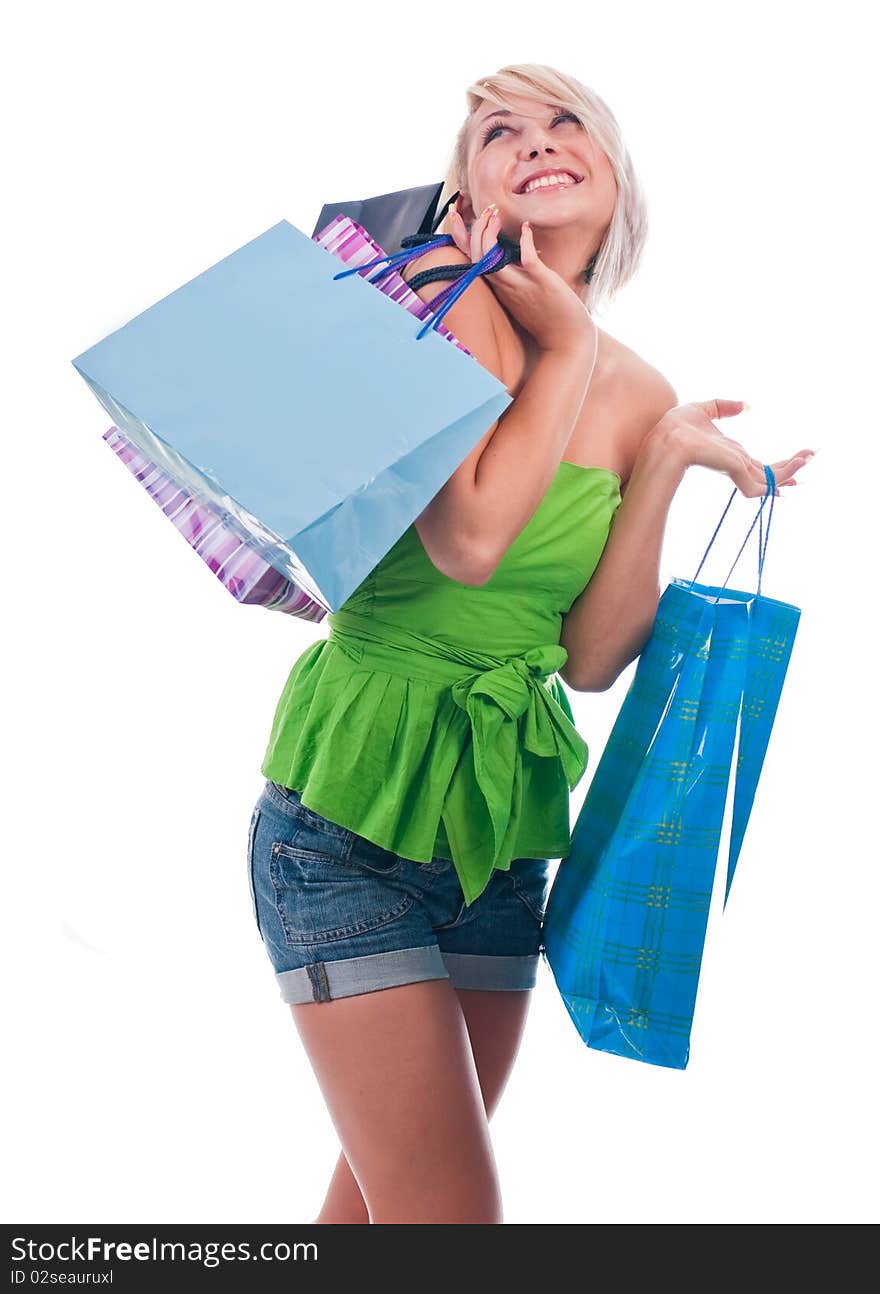 Women with shopping bags, isolated on white. Women with shopping bags, isolated on white