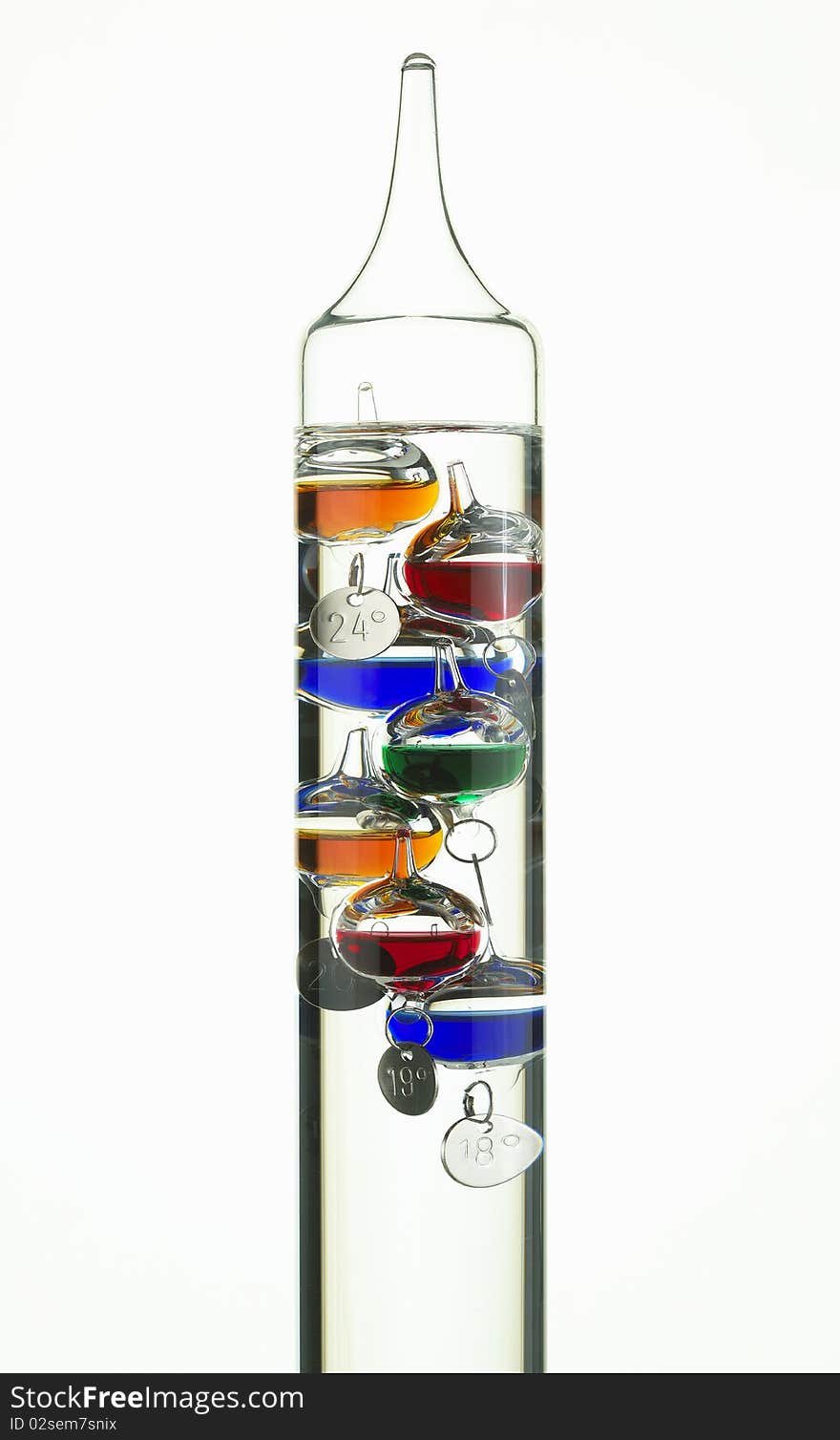 Galileo glass thermometer on white background