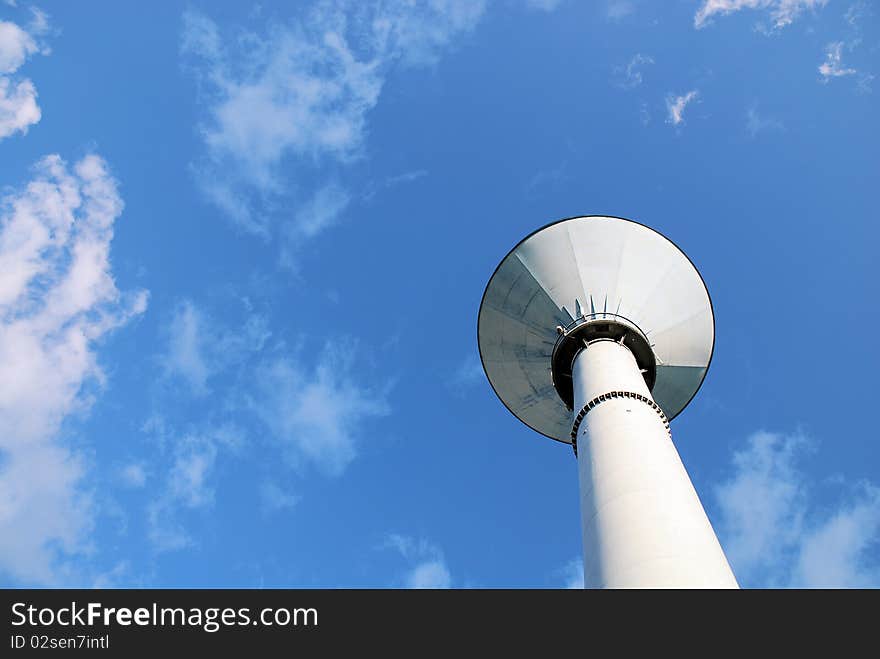 Water tower and the blue sky on the background