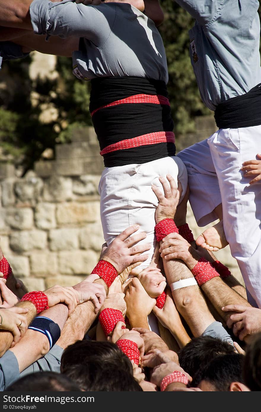 Castellers, human towers, in Sant Cugat del Valles, near to Barcelona. Catalonia, Spain.