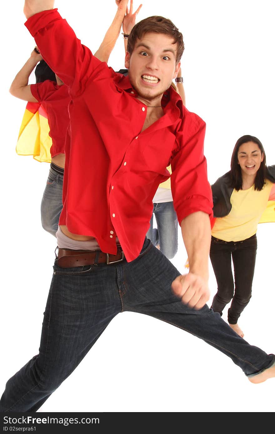 Young man jumping in front of other people