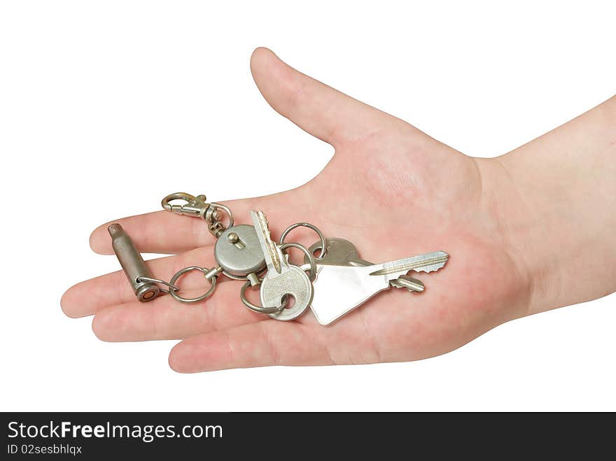 Key in the hand isolated with clipping path. Key in the hand isolated with clipping path