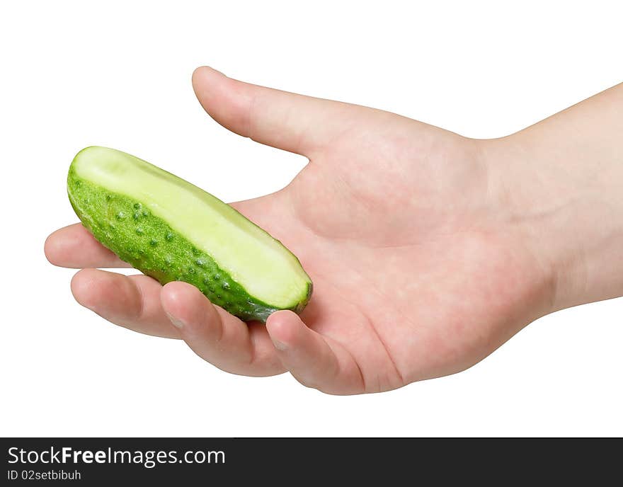 Sliced cucumber in hand isolated with path