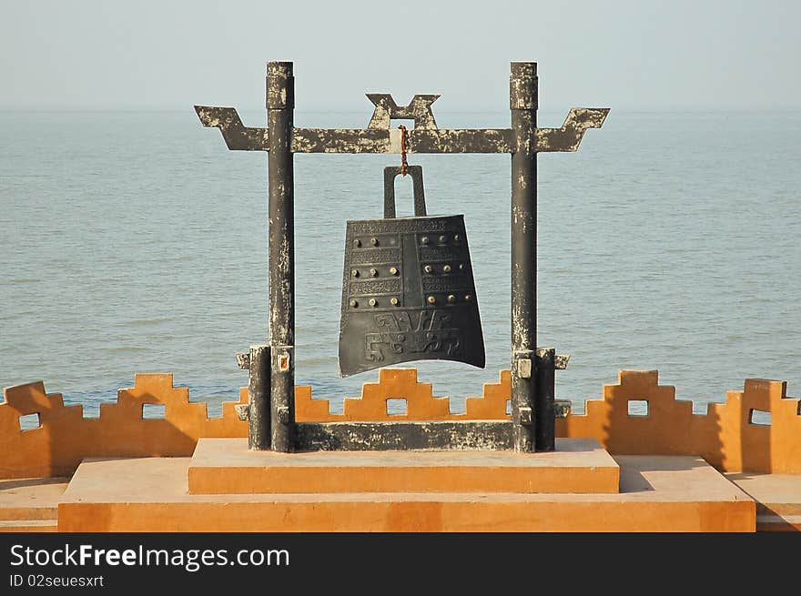 A traditional war-warning bell on coastline.Used by chinese coast guard in some hundreds of years ago. A traditional war-warning bell on coastline.Used by chinese coast guard in some hundreds of years ago