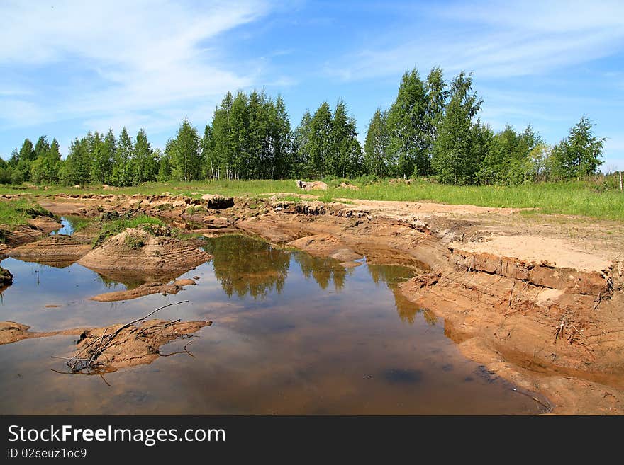 Small lake on old sandy quarry