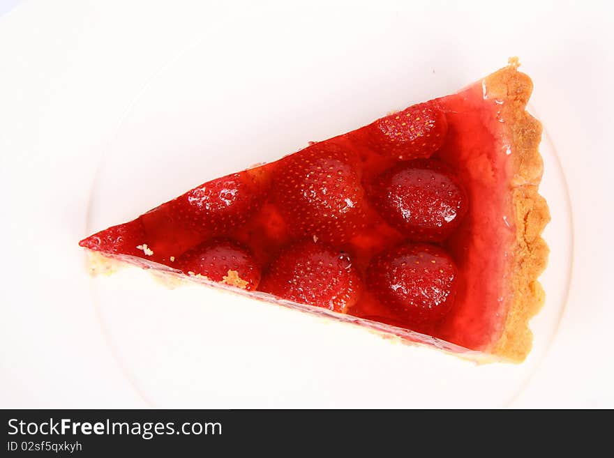 Piece of a Strawberry Tart on a white plate