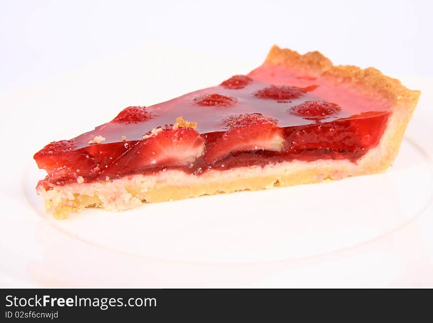 Piece of Strawberry Tart on a white plate