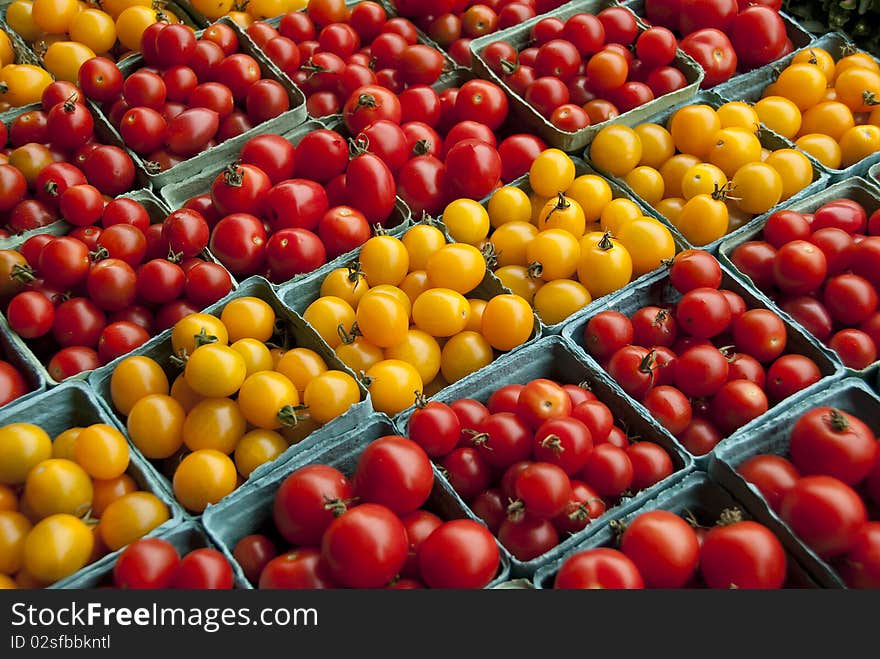 Tomatoes On Vegetable Stand