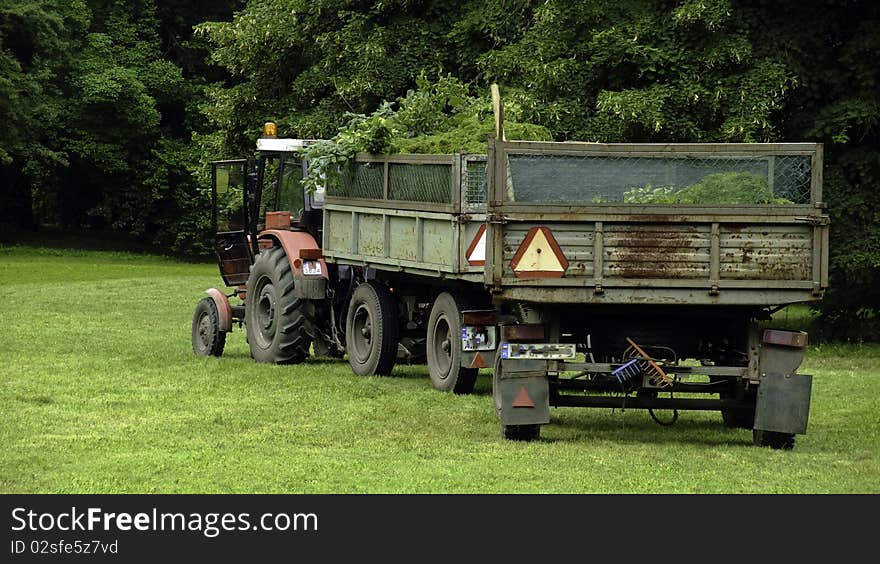 Tractor standing in the park. Tractor standing in the park