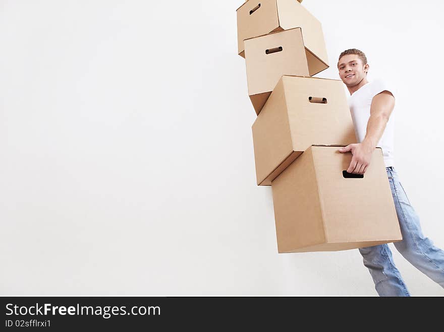 A young man with a cardboard box. A young man with a cardboard box