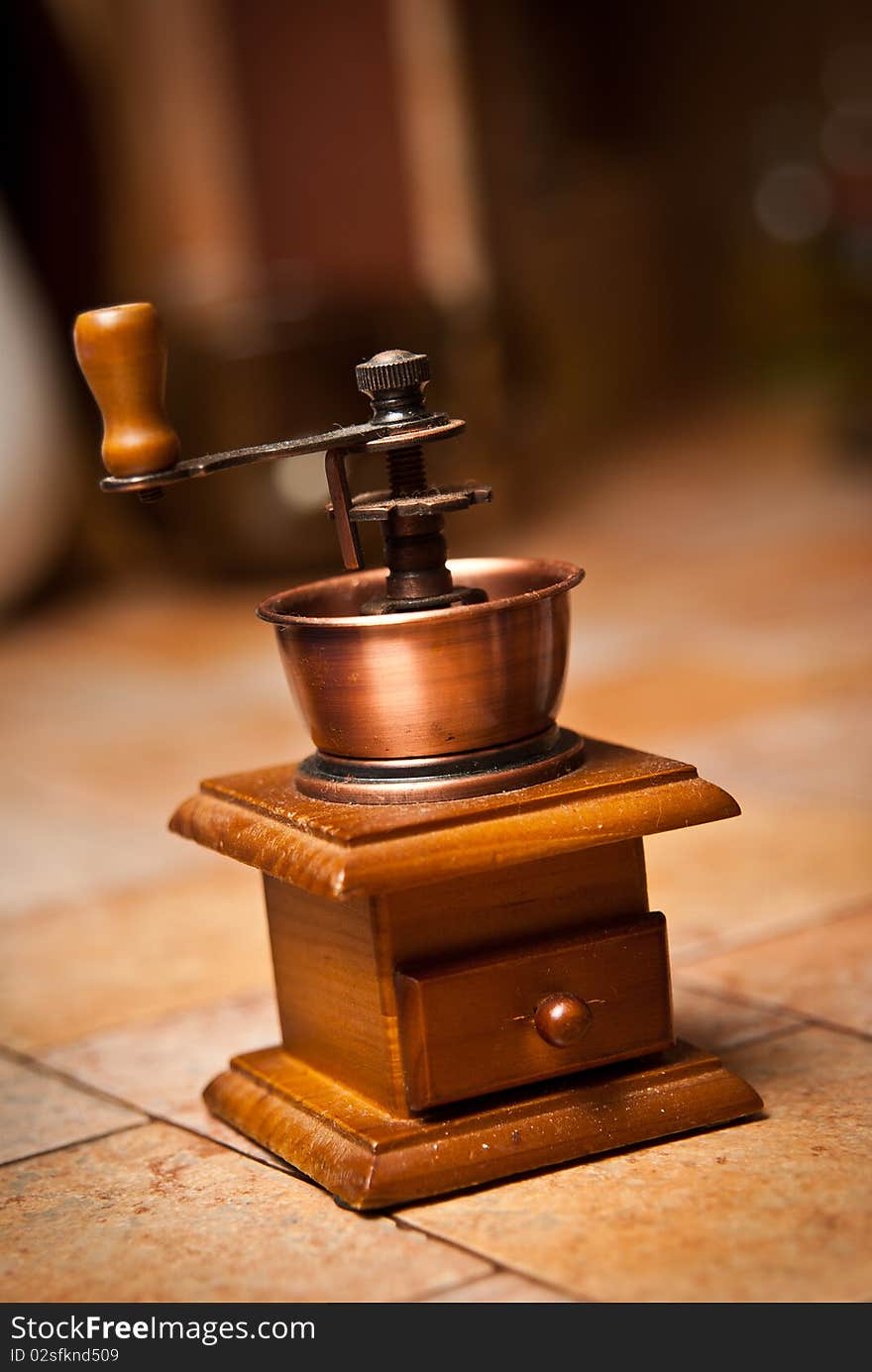 Grinder which is on the kitchen table. Grinder which is on the kitchen table