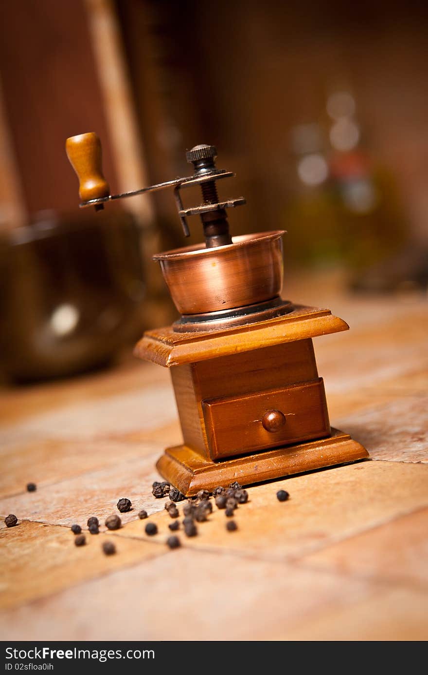 Grinder which is on the kitchen table. Grinder which is on the kitchen table