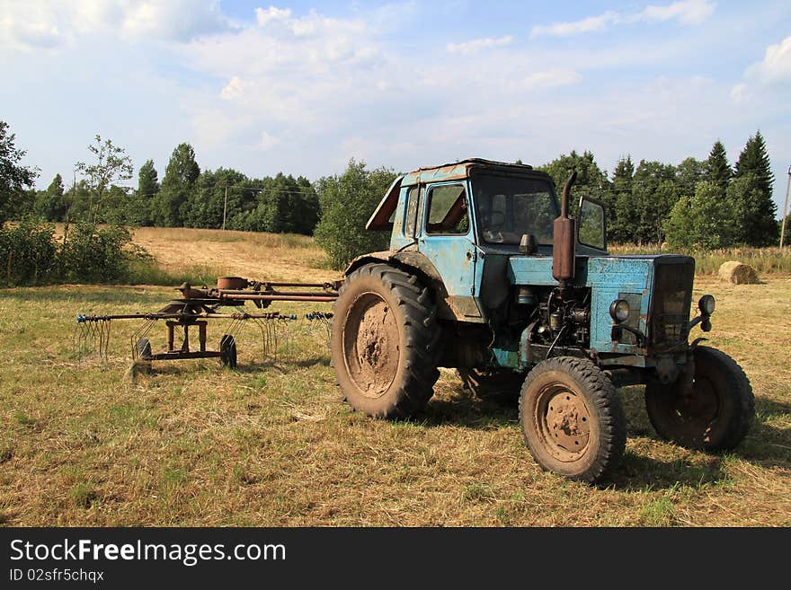 Old russian tractor on the farm. Old russian tractor on the farm.