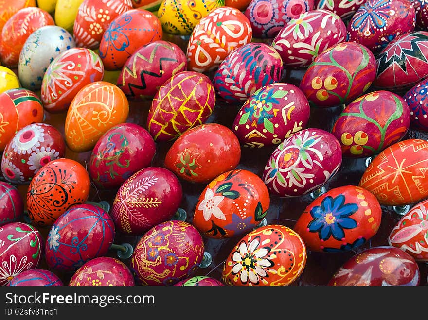 Yellow, red, orange painted Easter Eggs